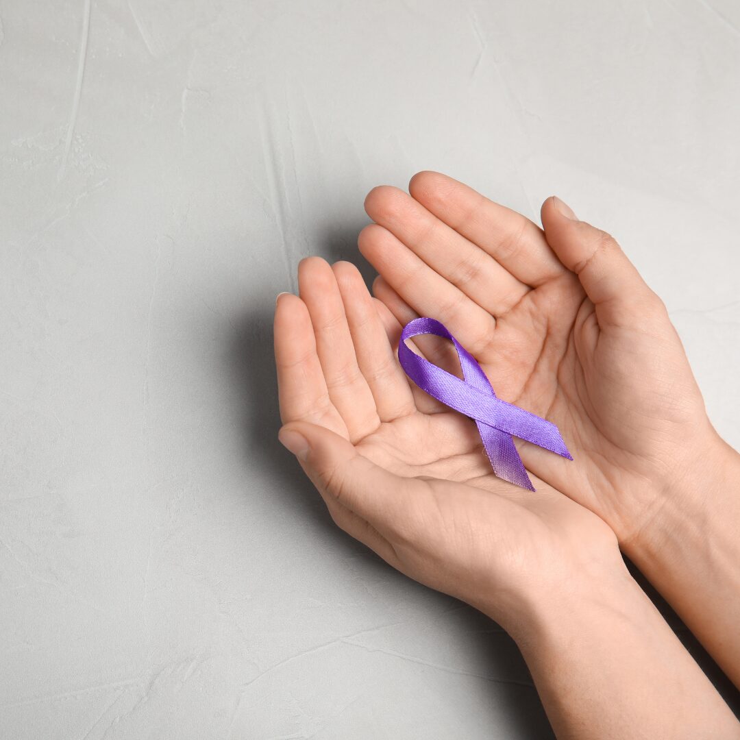 Purple ribbon in honor of domestic violence awareness month.